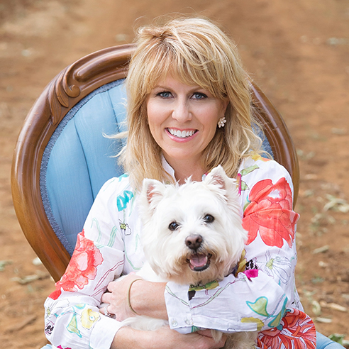 Image of Janis Lillian with her dog, Shelby